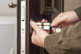 Locksmith installing door lock in Philadelphia